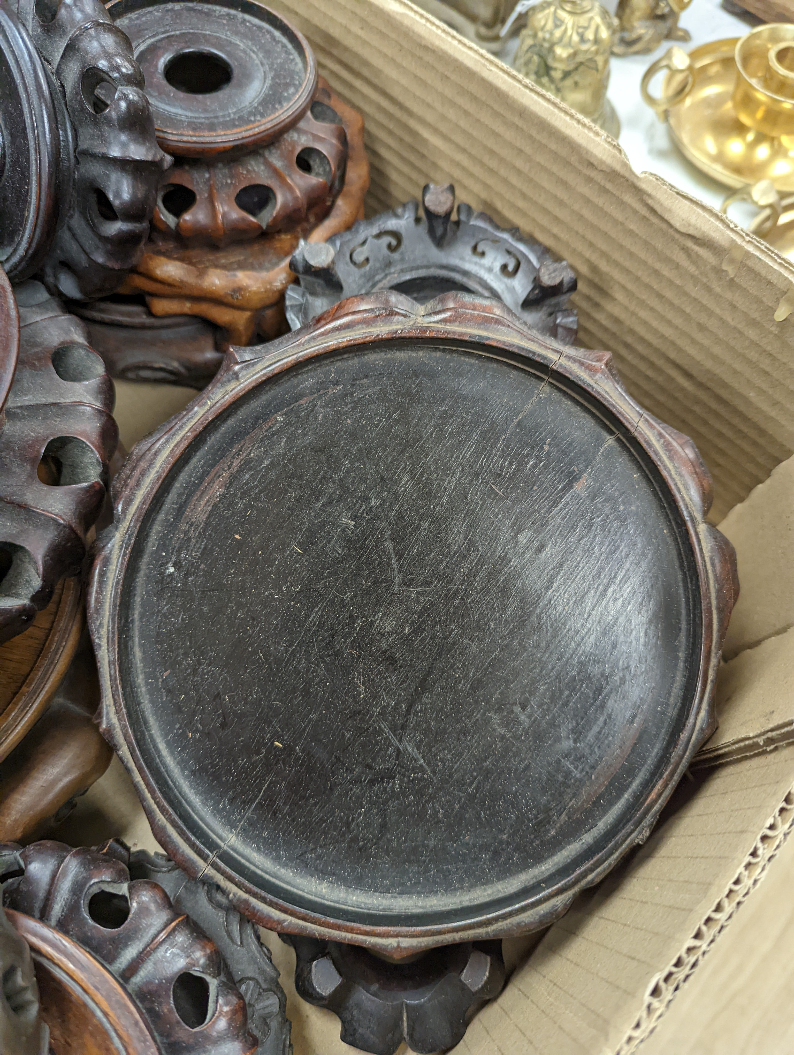 A large collection of Chinese hardwood stands.